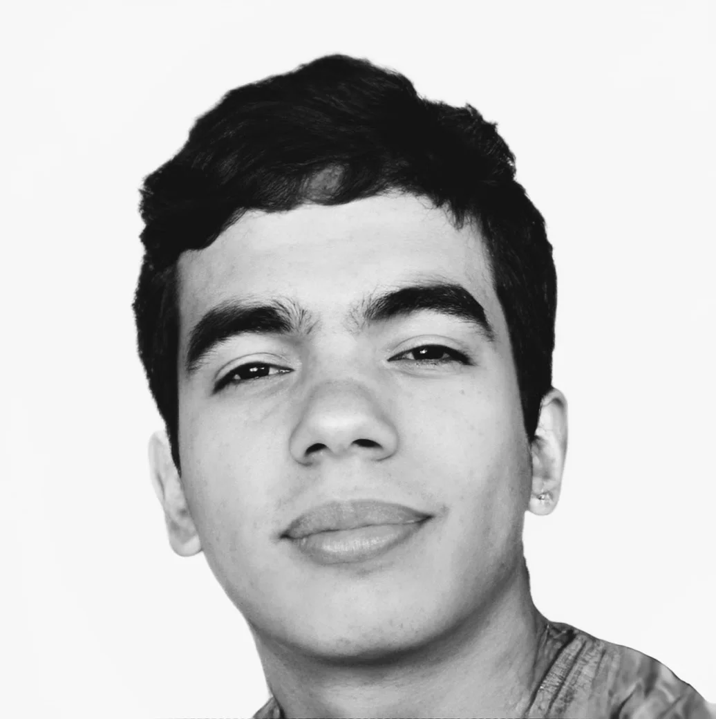 A black and white photo of a young man